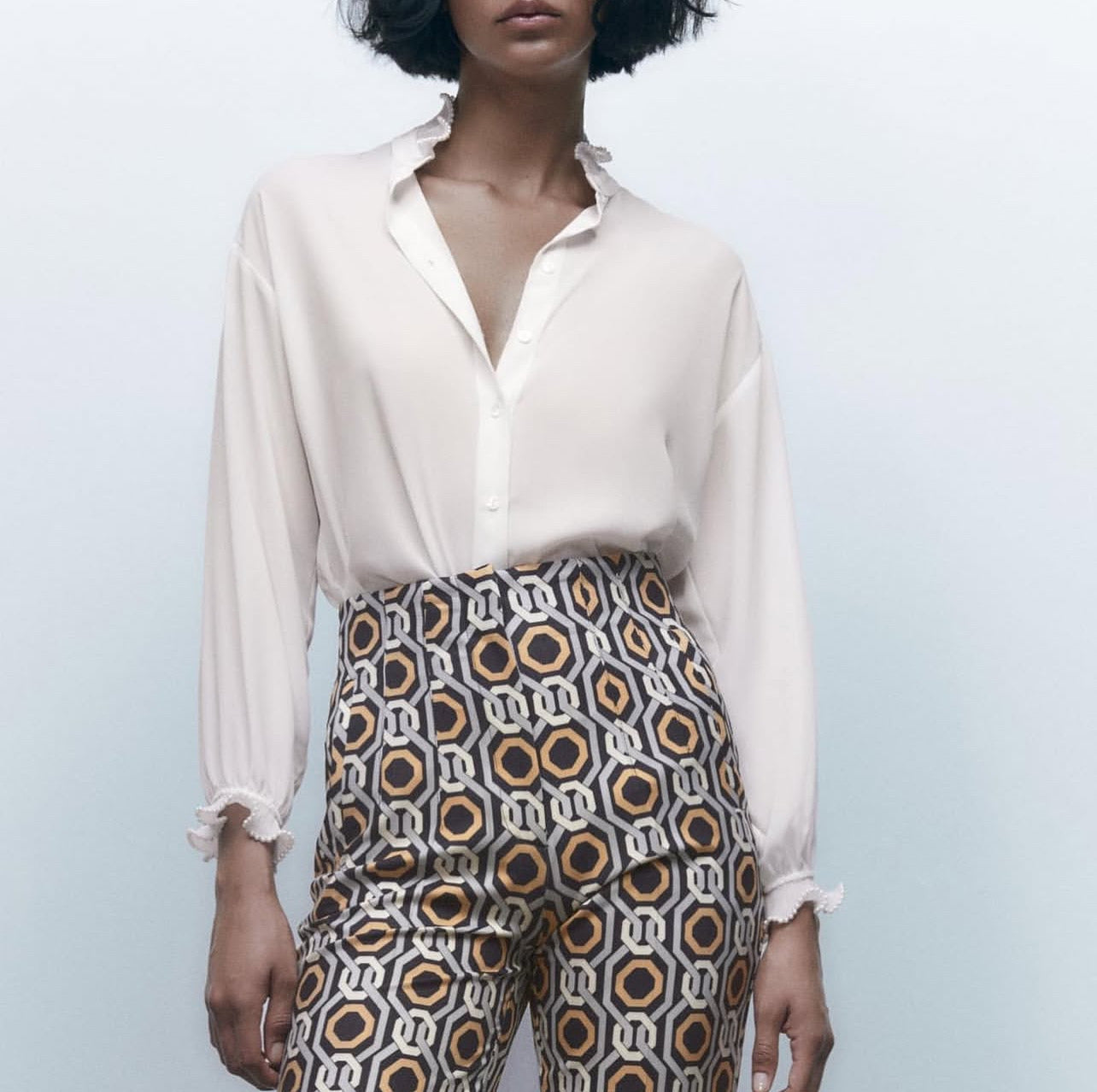 Zara
Pearl trim chiffon blouse