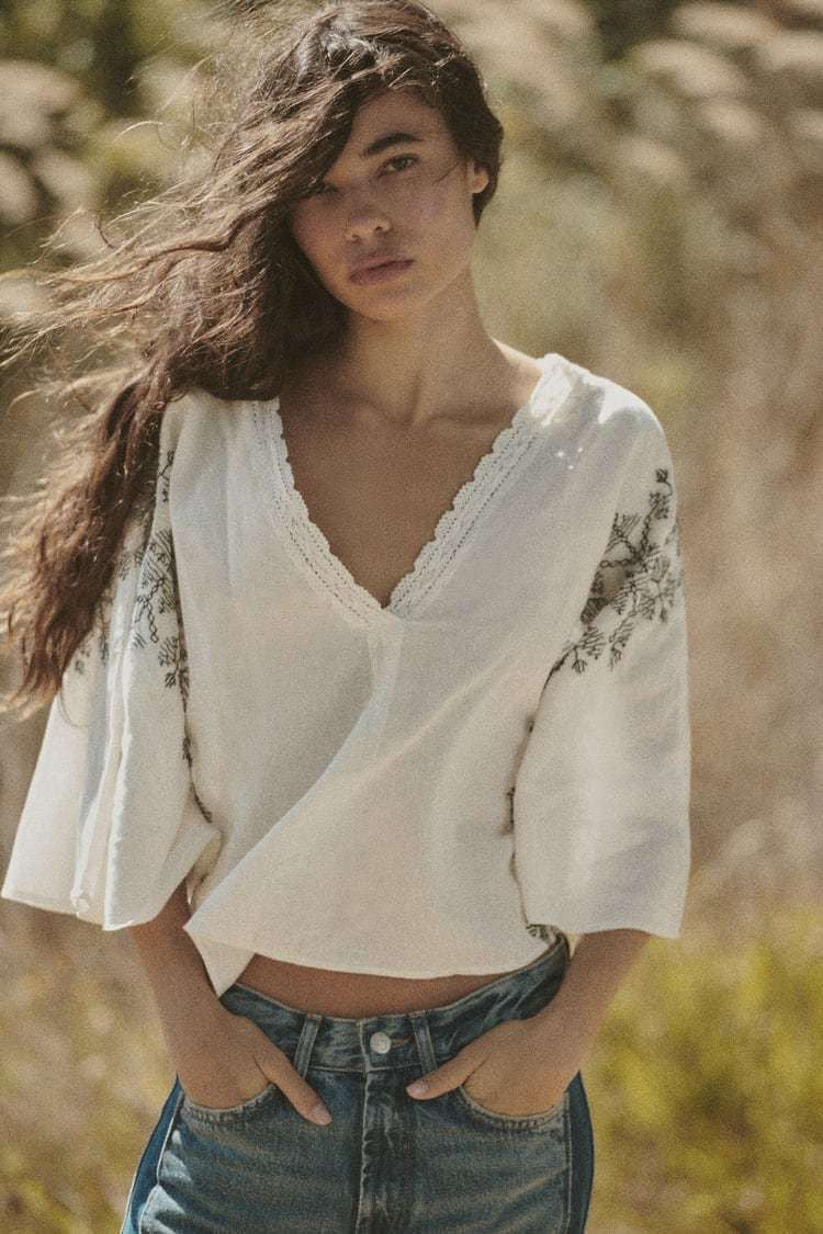 Zara
Embroidered linen blend cropped blouse