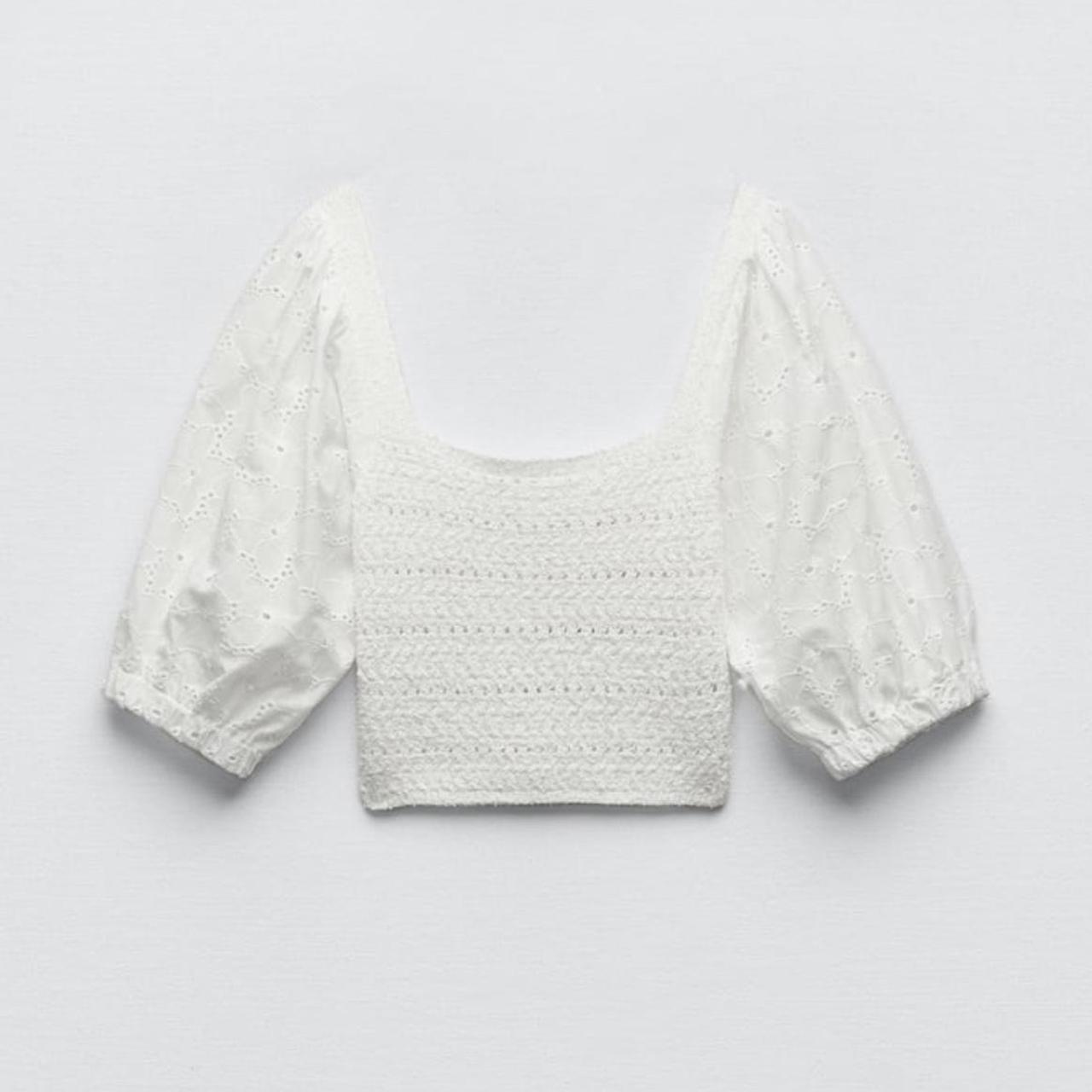 Zara
Combined knit embroidred top