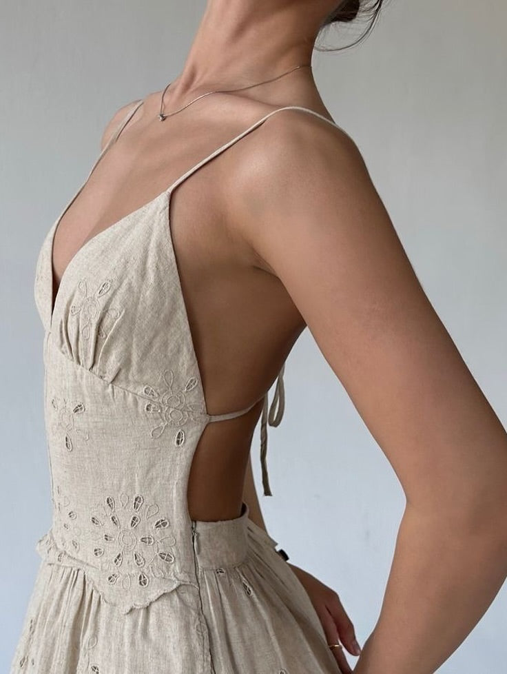 Zara
Backless linen cutwork dress