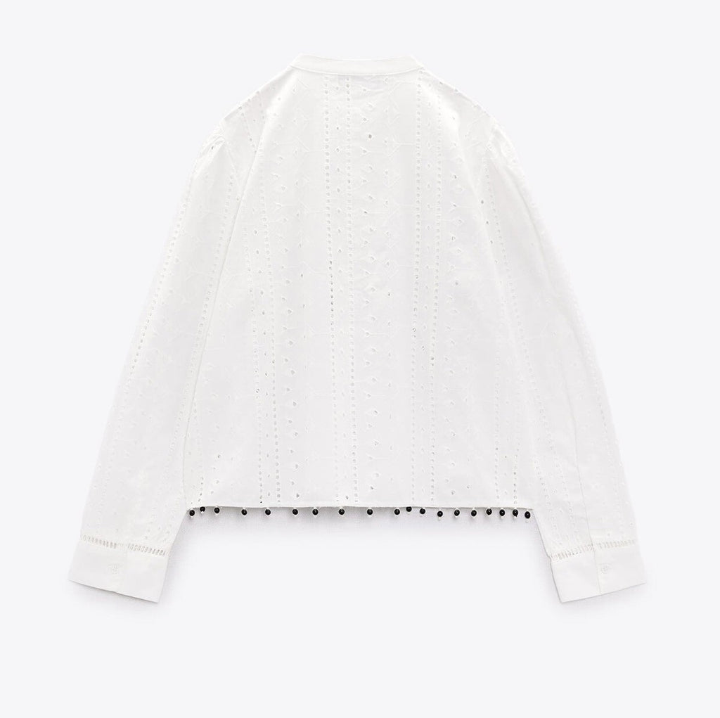 Zara
Cutwork beaded blouse