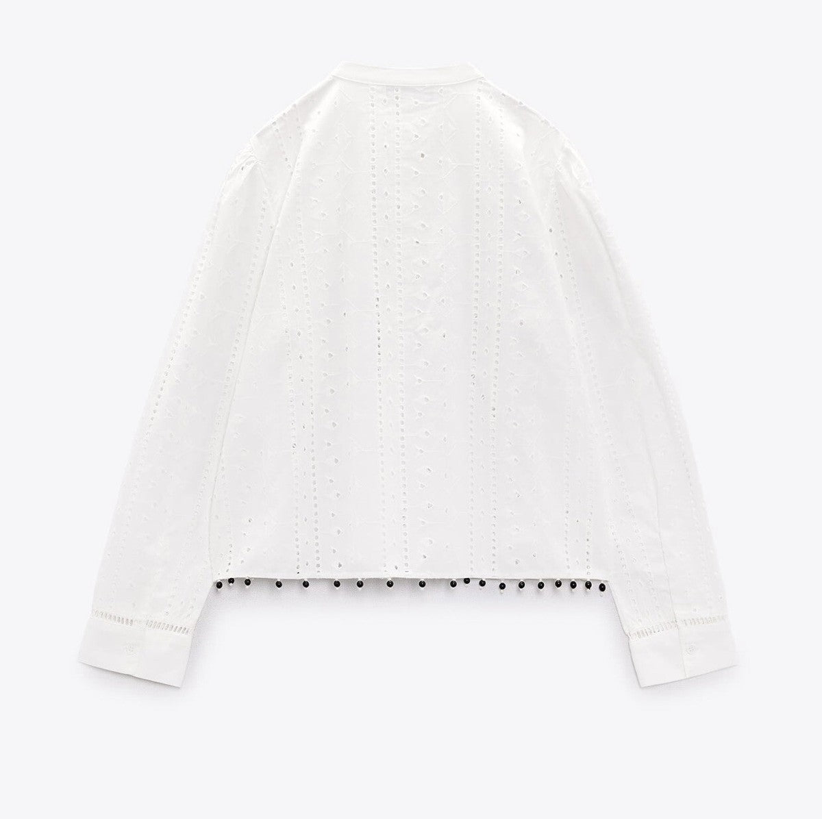 Zara
Cutwork beaded blouse