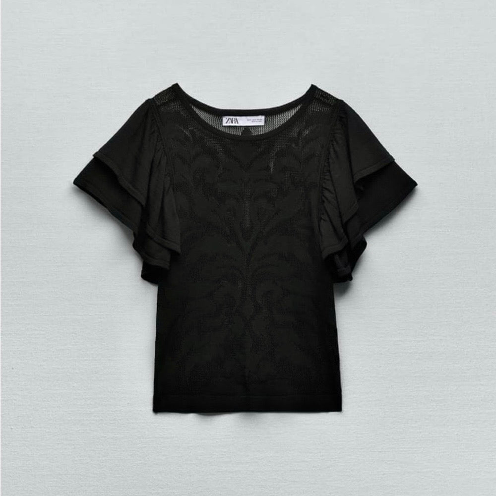 Zara
Mesh jacquard top
